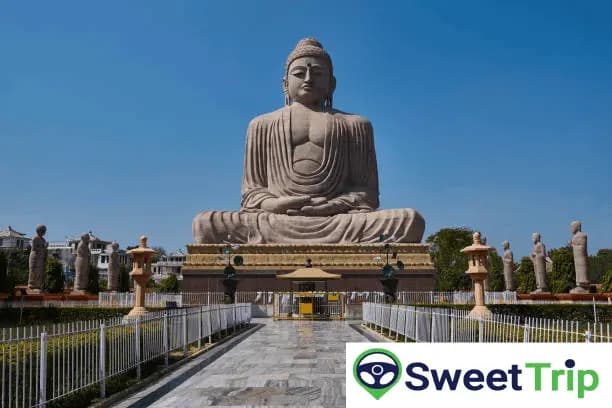 A statue of Lord Buddha in sitting position is shown.